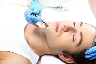 Microdermabrasion treatment performed on male client at Bewitching Cosmetic Clinic